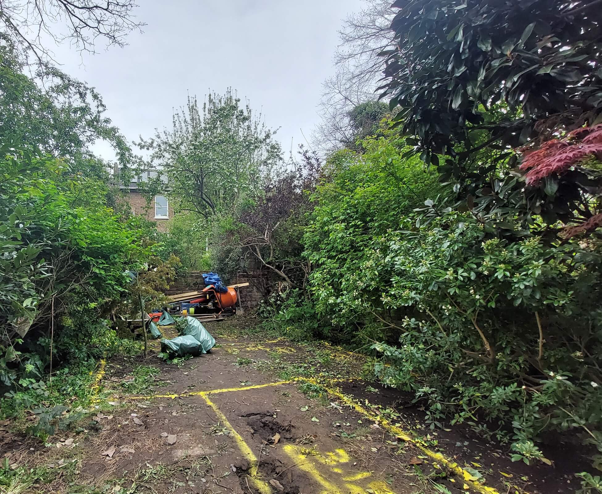 The garden was completely overgrown before landscaping works began, we managed to reshape and retain 3 of the existing trees to give a feeling of maturity to the new garden.