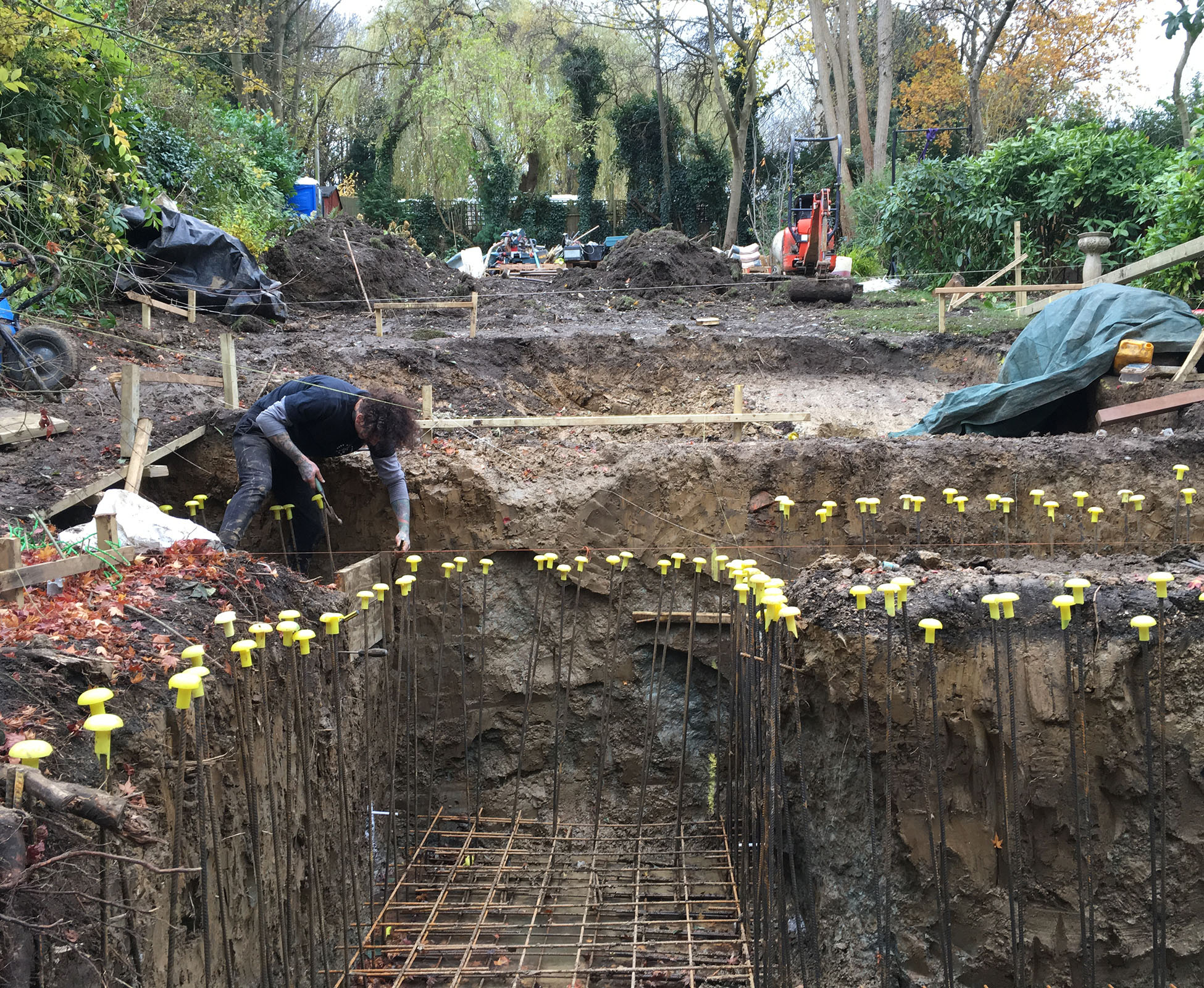 The garden in Muswell Hill, showing the steep 7m slope and excavations required at the start of the build.
