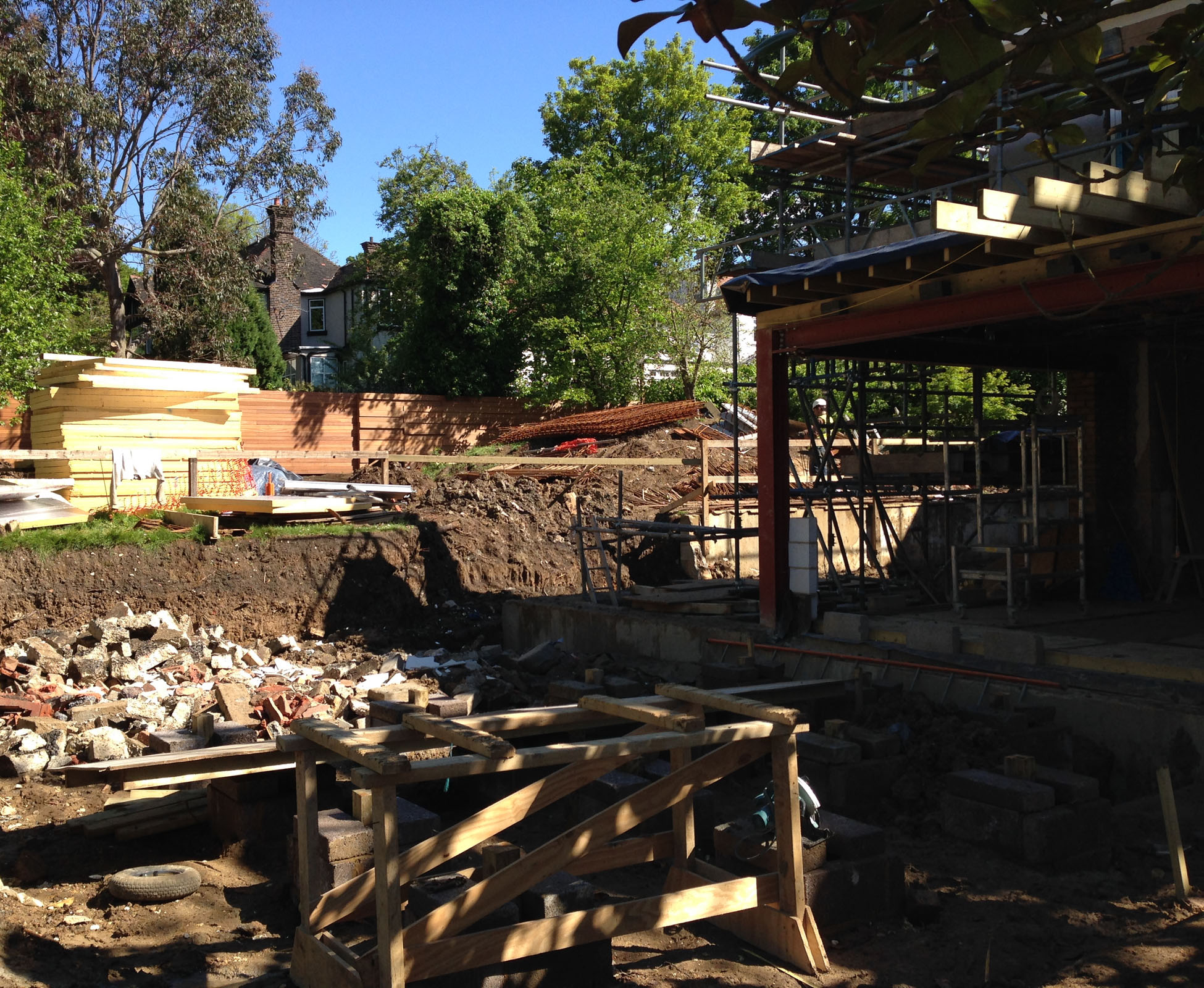 A view of the garden when the builders where working on the house, prior to the garden being landscaped in this North London garden.